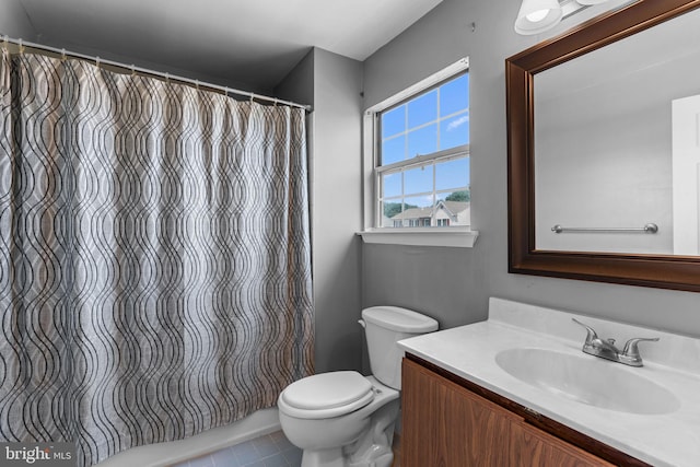 1040 Muscovy Ln, Bensalem, PA 19020 - bathroom featuring vanity, toilet, tile patterned floors, and a shower with shower curtain
