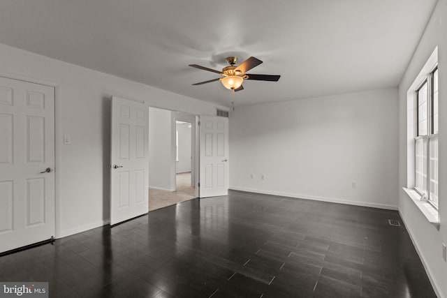 1040 Muscovy Ln, Bensalem, PA 19020 - unfurnished bedroom with baseboards, dark wood-style floors, and ceiling fan