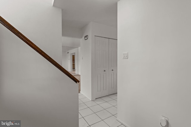 1040 Muscovy Ln, Bensalem, PA 19020 - hallway featuring light tile patterned floors, stairs, and baseboards