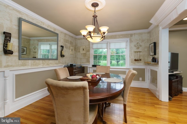 50 Skillman Rd, Skillman, NJ 08558 - dining room featuring plenty of natural light, light wood-style flooring, a chandelier, a decorative wall, and crown molding