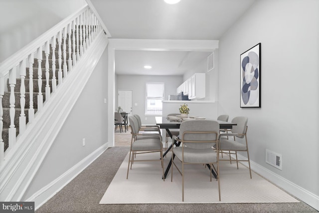 813 N Linwood, Baltimore, MD 21205 - dining space featuring stairway, carpet, and baseboards