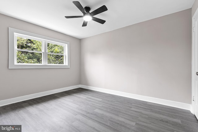 2723 Keating St, Temple Hills, MD 20748 - spare room featuring dark wood-type flooring, ceiling fan, and baseboards