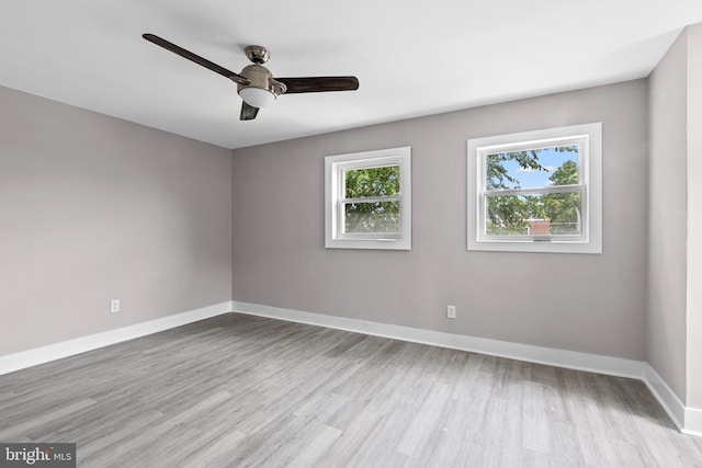 2723 Keating St, Temple Hills, MD 20748 - unfurnished room featuring wood finished floors, a ceiling fan, and baseboards