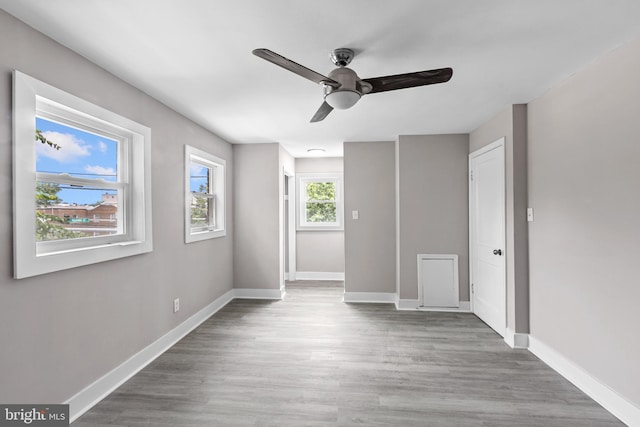 2723 Keating St, Temple Hills, MD 20748 - unfurnished bedroom featuring baseboards, wood finished floors, and a ceiling fan