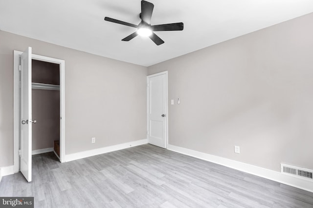 2723 Keating St, Temple Hills, MD 20748 - unfurnished bedroom with wood finished floors, a closet, baseboards, and ceiling fan