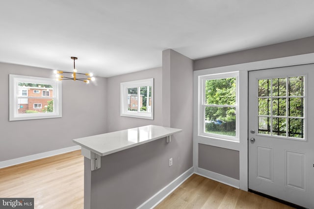 2723 Keating St, Temple Hills, MD 20748 - entrance foyer featuring a chandelier, baseboards, and light wood-style flooring
