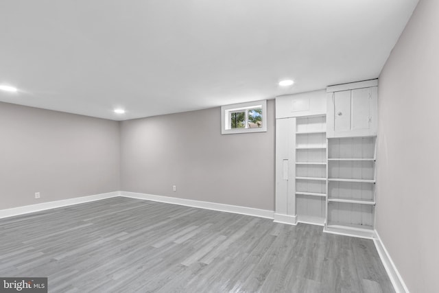 2723 Keating St, Temple Hills, MD 20748 - below grade area with wood finished floors, baseboards, and recessed lighting