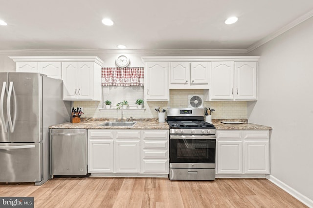 34 Swarthmore Ave, Stratford, NJ 08084 - kitchen with stainless steel appliances, white cabinets, ornamental molding, decorative backsplash, and recessed lighting