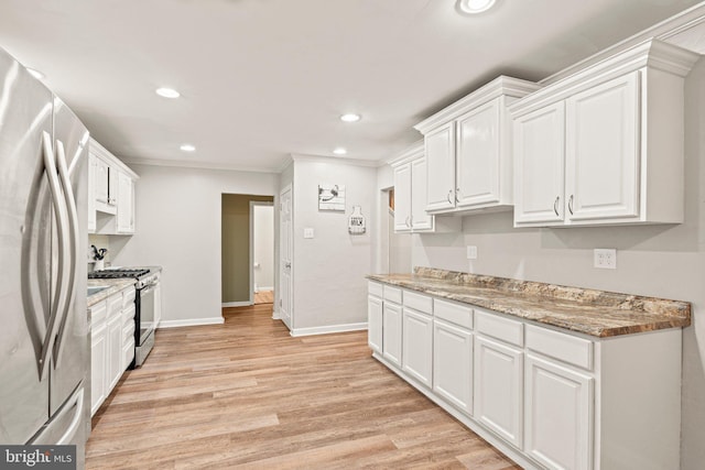 34 Swarthmore Ave, Stratford, NJ 08084 - kitchen with appliances with stainless steel finishes, white cabinetry, light wood-style floors, recessed lighting, and ornamental molding