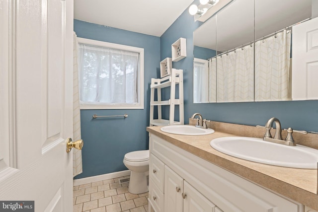 34 Swarthmore Ave, Stratford, NJ 08084 - full bathroom featuring double vanity and tile patterned flooring
