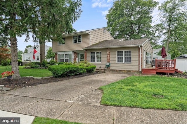 34 Swarthmore Ave, Stratford, NJ 08084 - view of front of property with a deck, a front yard, and roof with shingles