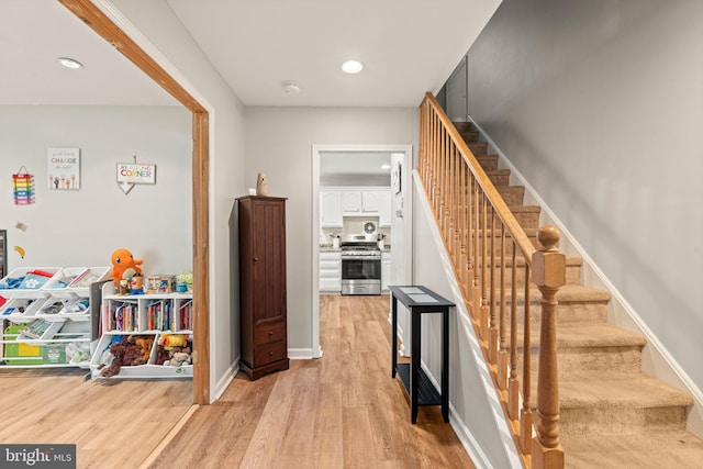 34 Swarthmore Ave, Stratford, NJ 08084 - stairway with wood finished floors and recessed lighting