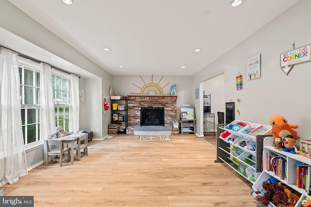 34 Swarthmore Ave, Stratford, NJ 08084 - living room featuring wood finished floors, recessed lighting, and a brick fireplace
