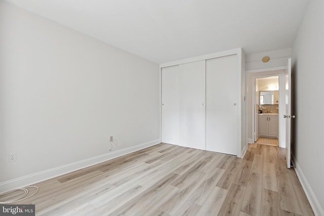 1900 John F Kennedy Blvd Unit 924, Philadelphia, PA 19103 - unfurnished bedroom with light wood-style floors and a closet