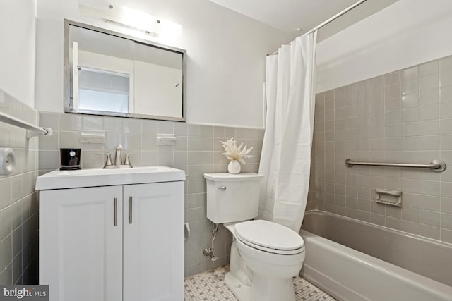 1900 John F Kennedy Blvd Unit 924, Philadelphia, PA 19103 - full bath featuring tile walls, vanity, tile patterned floors, shower / bathtub combination with curtain, and a wainscoted wall