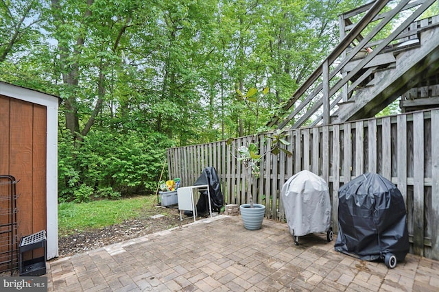 7100 Cipriano Springs Dr, Lanham, MD 20706 - view of patio with a grill and stairs