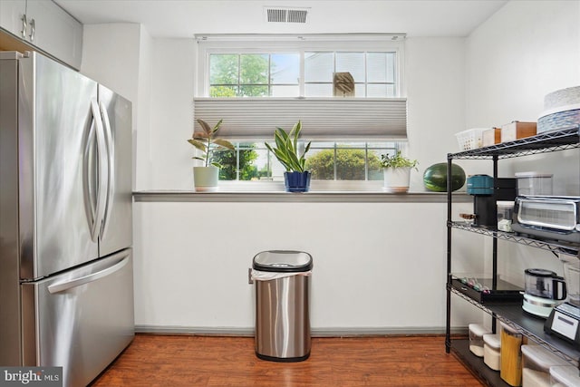 7100 Cipriano Springs Dr, Lanham, MD 20706 - kitchen with freestanding refrigerator, wood finished floors, and baseboards