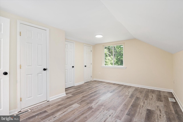 12820 Maple St, Silver Spring, MD 20904 - bonus room with wood finished floors, lofted ceiling, and baseboards