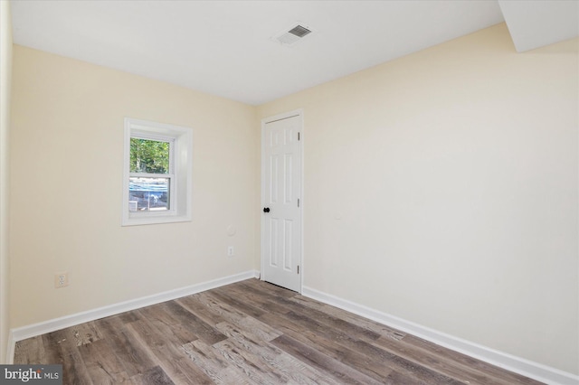 12820 Maple St, Silver Spring, MD 20904 - spare room featuring wood finished floors and baseboards