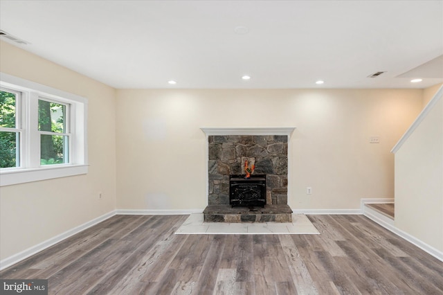 12820 Maple St, Silver Spring, MD 20904 - unfurnished living room featuring wood finished floors, baseboards, recessed lighting, and a fireplace