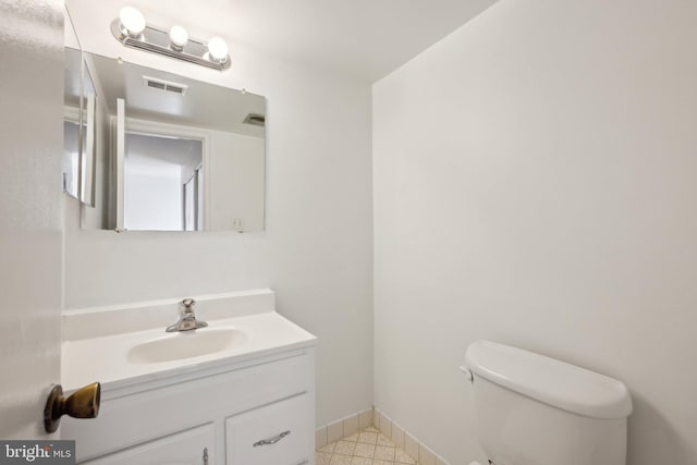 2114 Bonnywood Ln Unit 201, Silver Spring, MD 20902 - bathroom with toilet, vanity, and baseboards