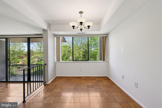 2114 Bonnywood Ln Unit 201, Silver Spring, MD 20902 - unfurnished room with baseboards and a chandelier
