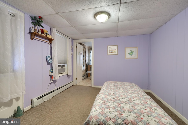125 S 3rd St, Lebanon, PA 17042 - carpeted bedroom featuring a baseboard heating unit, a drop ceiling, and a decorative wall