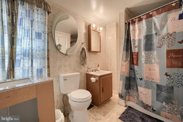 125 S 3rd St, Lebanon, PA 17042 - bathroom featuring tile walls, vanity, curtained shower, and marble finish floors