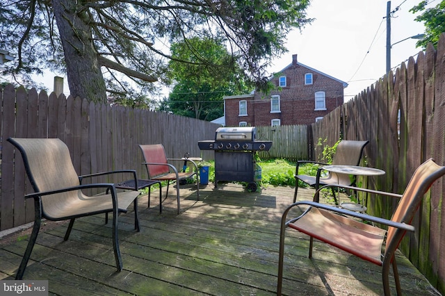 125 S 3rd St, Lebanon, PA 17042 - wooden terrace featuring a fenced backyard and area for grilling