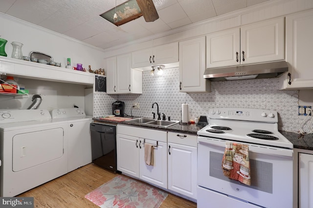 125 S 3rd St, Lebanon, PA 17042 - kitchen featuring electric stove, under cabinet range hood, washer and dryer, dishwasher, and crown molding
