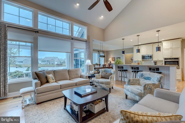 30957 Fowlers Path, Millsboro, DE 19966 - living area featuring light wood finished floors, a ceiling fan, recessed lighting, and high vaulted ceiling