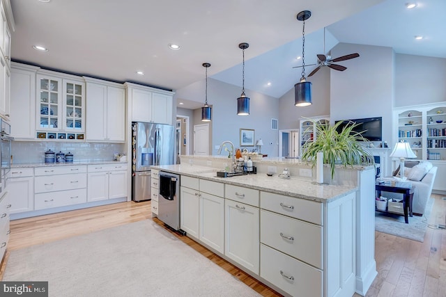 30957 Fowlers Path, Millsboro, DE 19966 - kitchen with appliances with stainless steel finishes, a ceiling fan, open floor plan, light wood-style flooring, and white cabinetry