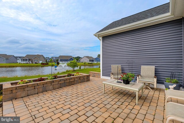 30957 Fowlers Path, Millsboro, DE 19966 - view of patio / terrace with a water view and a residential view