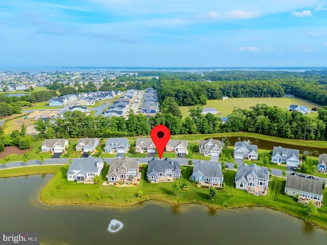 30957 Fowlers Path, Millsboro, DE 19966 - aerial view of residential area featuring a nearby body of water and a tree filled landscape