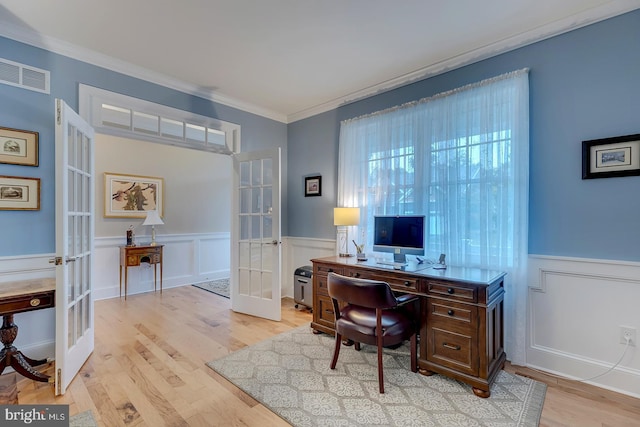 30957 Fowlers Path, Millsboro, DE 19966 - home office featuring french doors, a wainscoted wall, crown molding, light wood-style floors, and a decorative wall