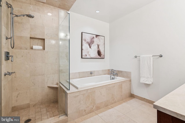 50 S 16th St Unit 4507, Philadelphia, PA 19102 - bathroom featuring a bath, a tile shower, vanity, and tile patterned floors