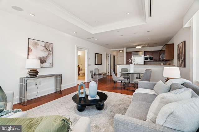 50 S 16th St Unit 4507, Philadelphia, PA 19102 - living area featuring a raised ceiling, crown molding, wood finished floors, and recessed lighting