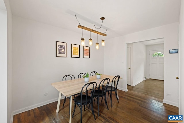 1007 Saint Charles Ave, Charlottesville, VA 22901 - dining area with dark wood finished floors and baseboards
