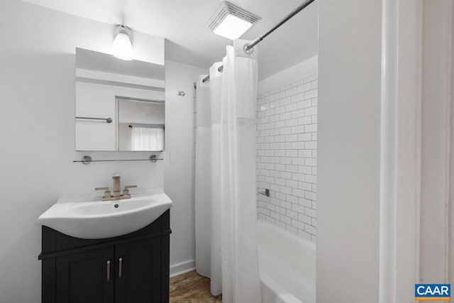 1007 Saint Charles Ave, Charlottesville, VA 22901 - bathroom featuring vanity and shower / tub combo with curtain