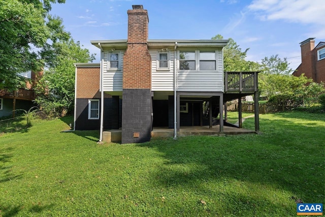 1007 Saint Charles Ave, Charlottesville, VA 22901 - rear view of property with a chimney, a patio area, and a wooden deck