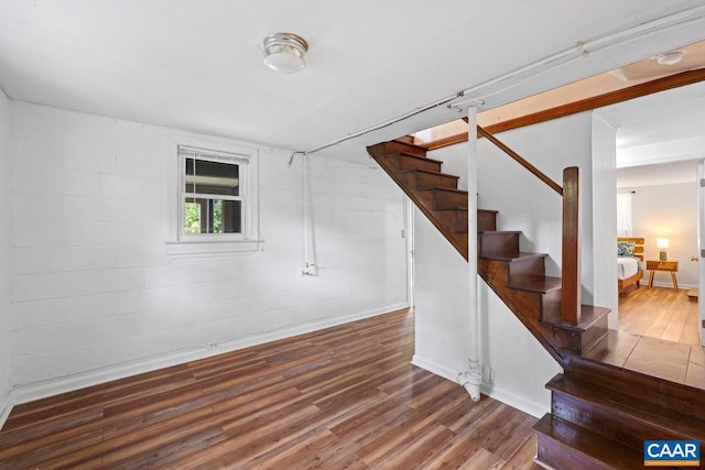 1007 Saint Charles Ave, Charlottesville, VA 22901 - stairway with wood finished floors and baseboards