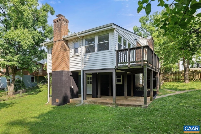 1007 Saint Charles Ave, Charlottesville, VA 22901 - rear view of property with a chimney, a patio area, and a wooden deck