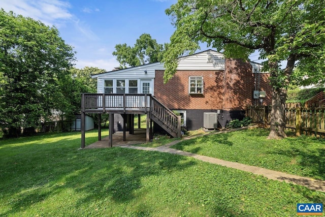 1007 Saint Charles Ave, Charlottesville, VA 22901 - back of property featuring stairway, a deck, central AC unit, a patio, and brick siding