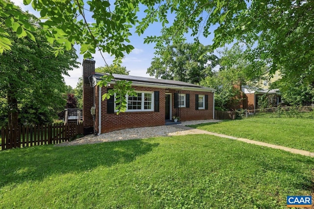 1007 Saint Charles Ave, Charlottesville, VA 22901 - ranch-style home with solar panels, a chimney, and brick siding