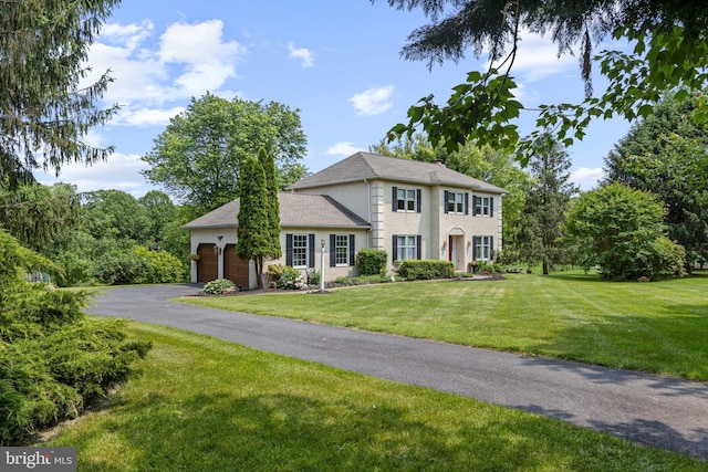 108 Partridge Way, Landenberg, PA 19350 - colonial-style house with a front yard, a garage, and driveway