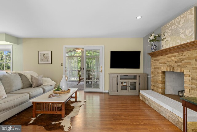 108 Partridge Way, Landenberg, PA 19350 - living room with plenty of natural light, wood finished floors, a fireplace with raised hearth, recessed lighting, and ceiling fan