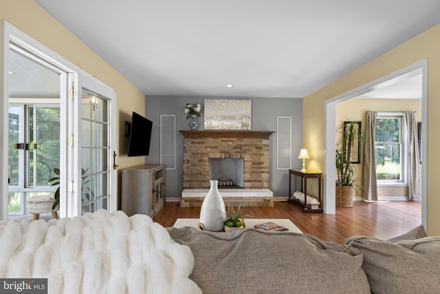 108 Partridge Way, Landenberg, PA 19350 - living area featuring wood finished floors and a stone fireplace