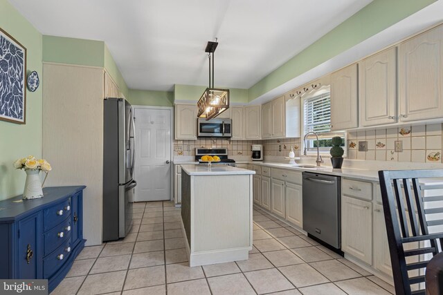 108 Partridge Way, Landenberg, PA 19350 - kitchen featuring stainless steel appliances, tasteful backsplash, a center island, and light tile patterned floors