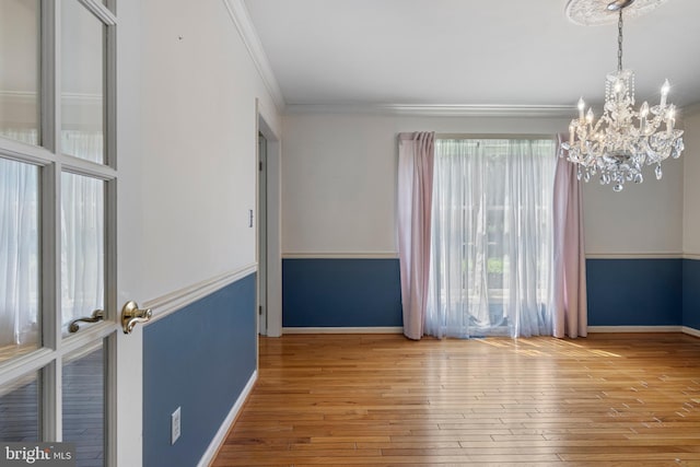 108 Partridge Way, Landenberg, PA 19350 - spare room with a chandelier, crown molding, and hardwood / wood-style flooring