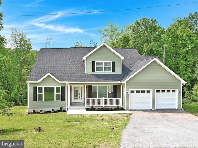 1026 Indian Dr, Auburn, PA 17922 - view of front facade featuring a porch, a garage, asphalt driveway, a front yard, and roof with shingles